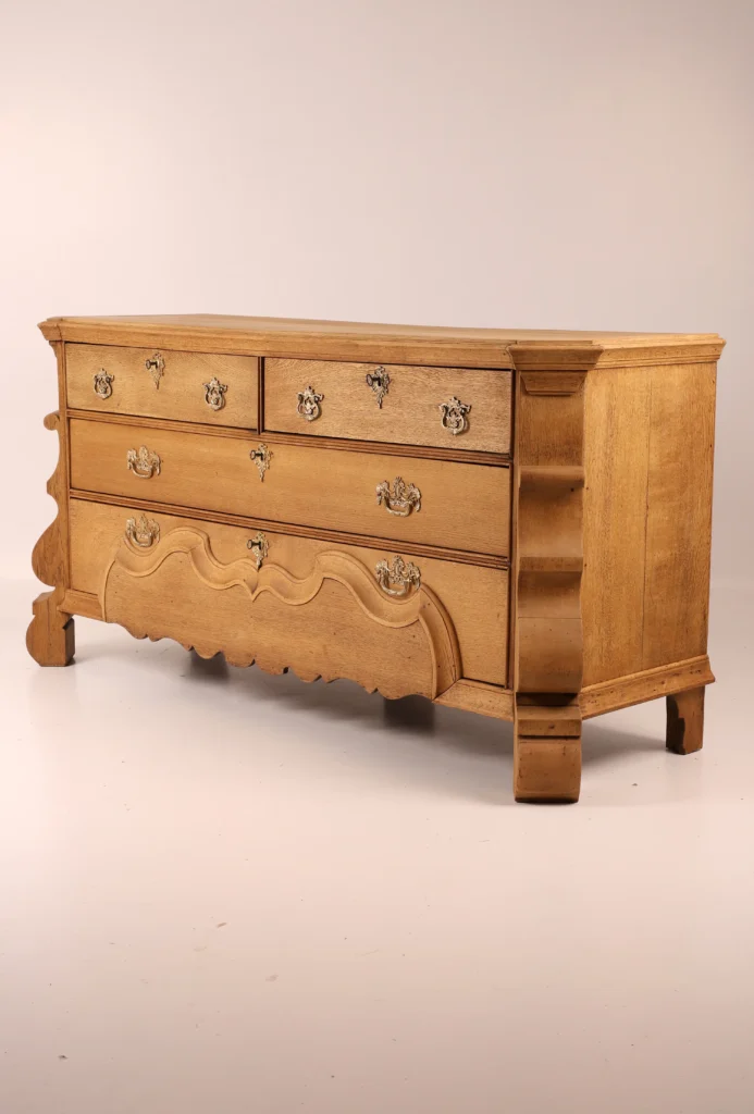 A late Baroque oak commode from the Netherlands