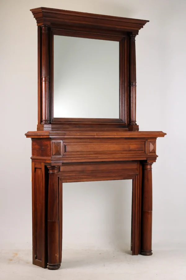Late 19th Century French Henri II Solid Walnut Fireplace Mantel with Overmantel Mirror